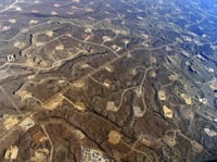 In areas where shale-drilling/hydraulic fracturing is heavy, a dense web of roads, pipelines and well pads cut through forests and grasslands.